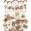 A bird house calender craft features the Classic Christmas small transfer on it.