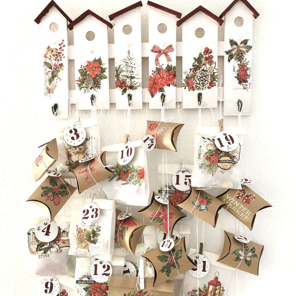A bird house calender craft features the Classic Christmas small transfer on it.