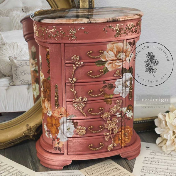 A vintage tall jewelry box refurbished by Rustic Charm Restored is painted dark mauve and features the Classic Peach Flowers small transfer on it.