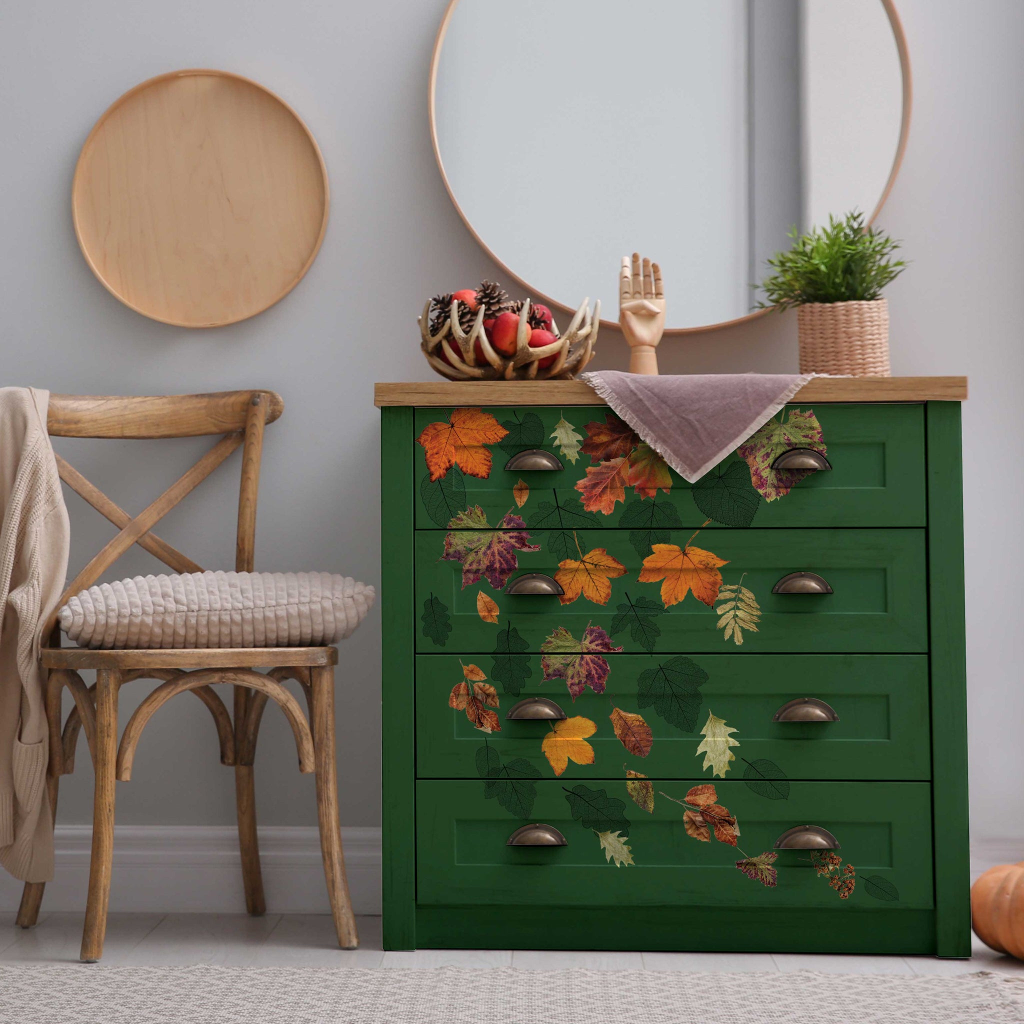 A 4-drawer green dresser features the Crunchy Leaves Forever small transfer on its drawers.
