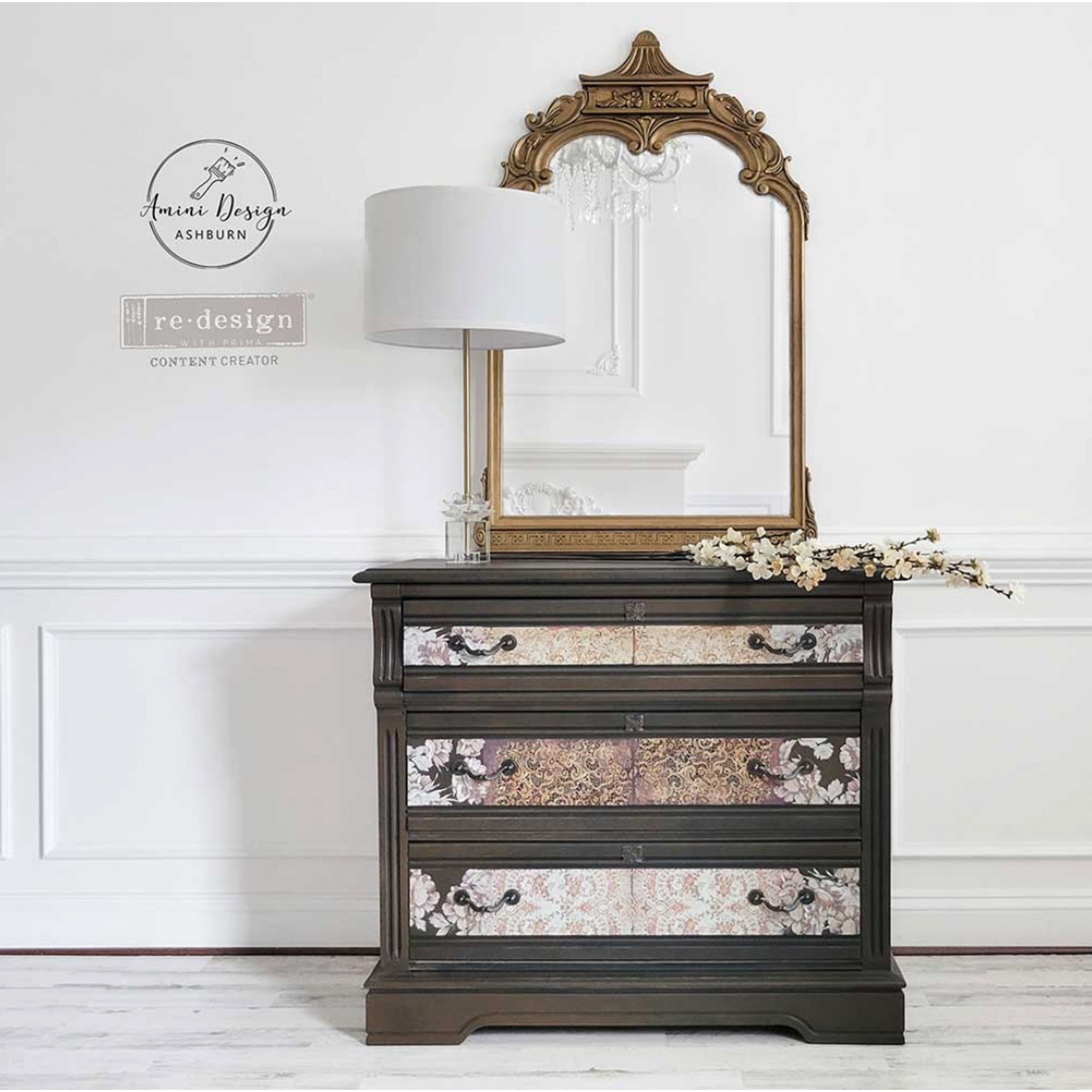 A vintage dresser refurbished by Amini Design Ashburn, a ReDesign with Prima Content Creator, is painted dark brown and features the Delicate Lace small transfers on its drawers.