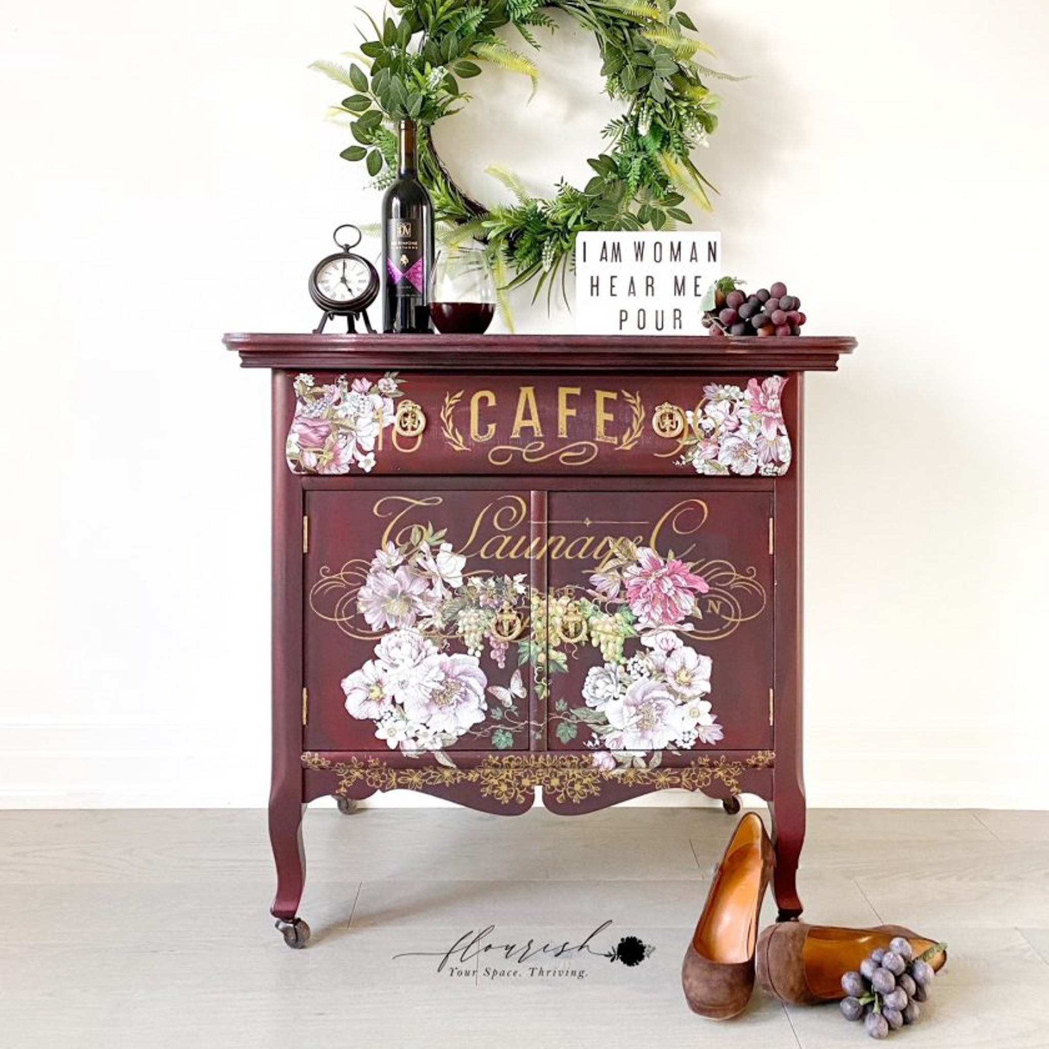 A small vintage drink cabinet refurbished by Flourish Your Space Thriving is painted a deep red-brown and features the Dreamy Florals small transfer on it.