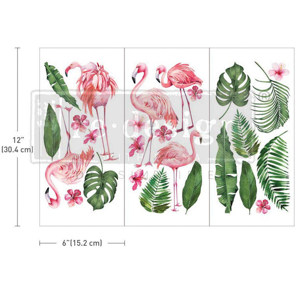 Three sheets of a small rub-on transfer that features pink flamingos and tropical plants are on a white background. Measurements for 1 sheet reads: 12" [30.4 cm] by 6" [15.2 cm].