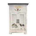 A vintage small end table is painted country white and features the Home & Farm small transfer on a front panel and doors.
