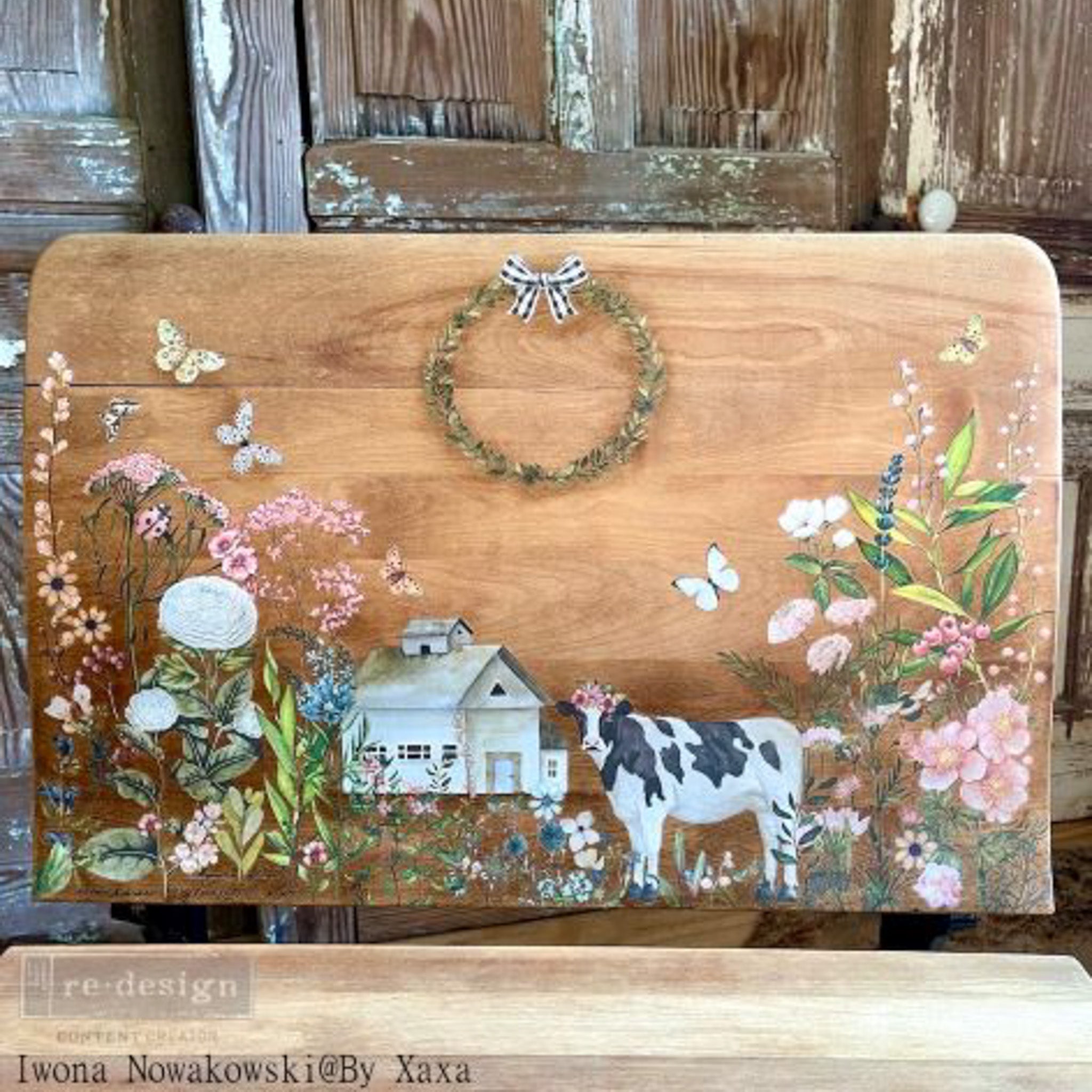 A wood TV tray refurbished by Iwona Nowakowski @ By Xaxa is stained a natural wood color and features the Home & Farm small transfer on it.
