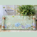 A wood serving tray refurbished by Click 2 Restore is painted mint green and features ReDesign with Prima's Mystic Hydrangea small transfer on it.