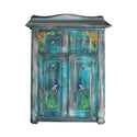 A vintage short storage cabinet is painted a blend of teal-blue and grey and features ReDesign with Prima's Peacock Paraside small transfer on its doors and drawers.