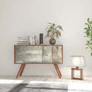 A modern console table is stained a natural wood and features ReDesign with Prima's La Spaccatura tissue paper on its doors and drawers.