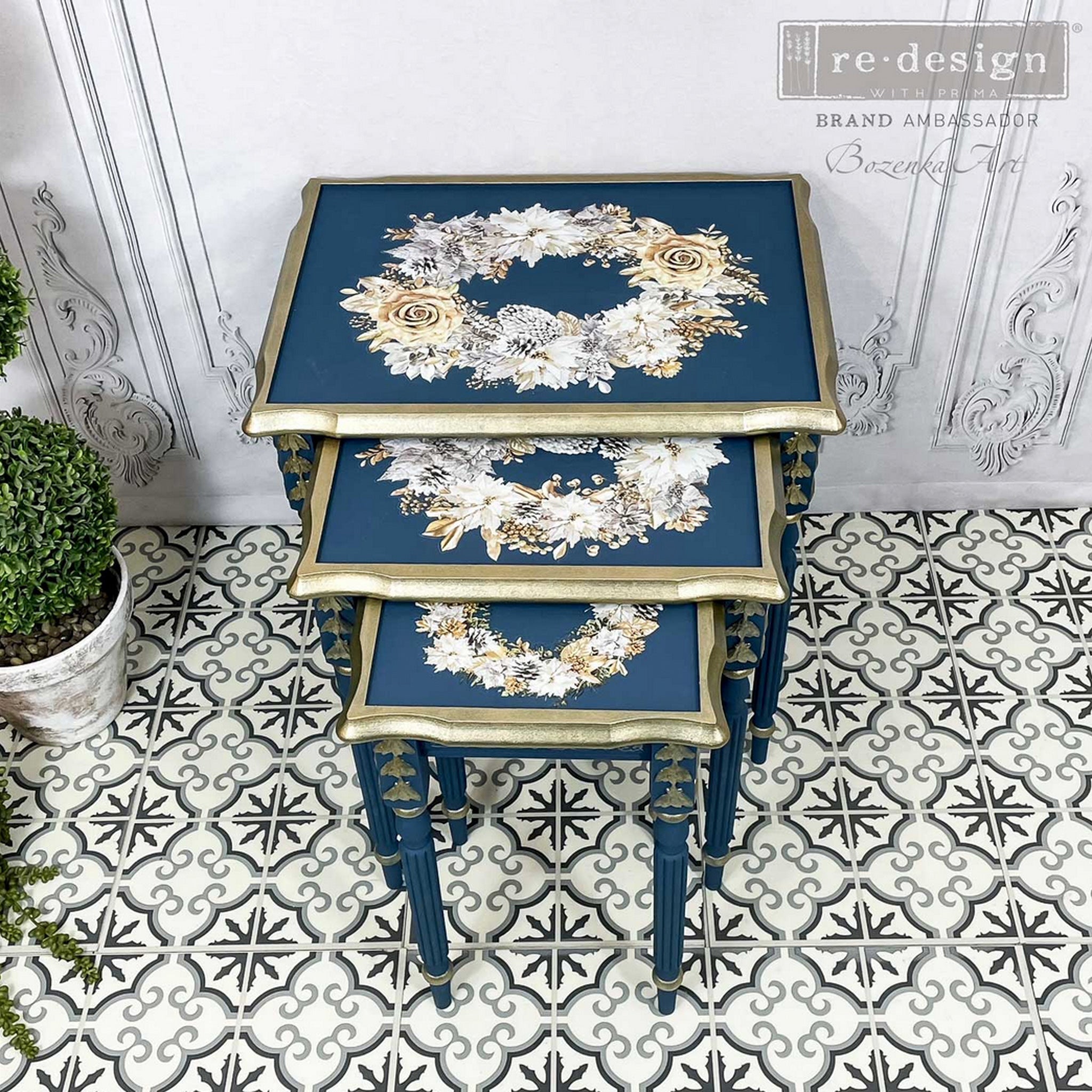 Three nesting side tables refurbished by Bozenka Art, a ReDesign with Prima Brand Ambassador, are painted blue with gold trim and feature the A Gilded Moment small transfer on the tops of them.
