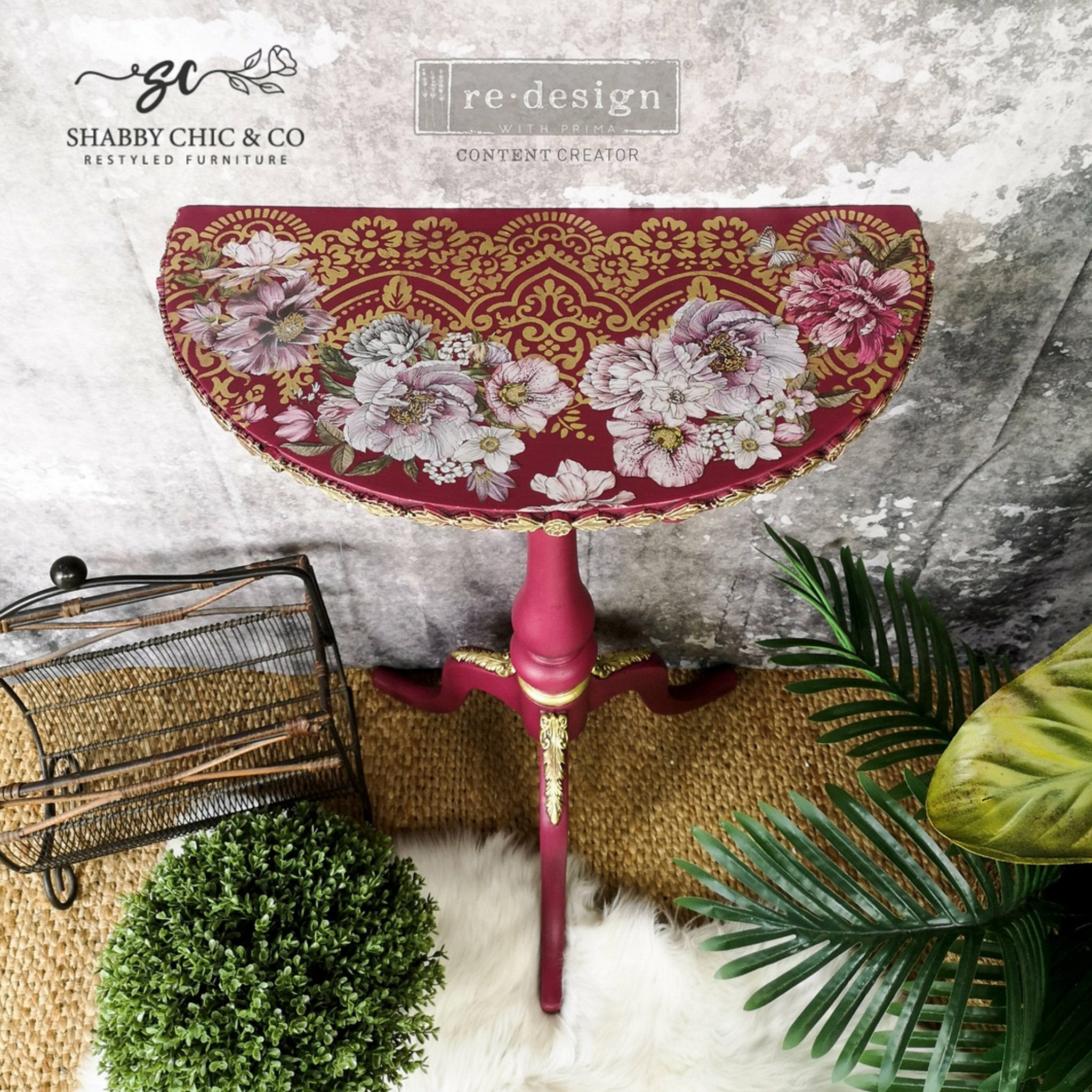 A vintage half circle side table refurbished by Shabby Chic & Co Restyled Furniture, a ReDesign with Prima Content Creator, is painted dark red and features the Dreamy Florals small transfer on it.