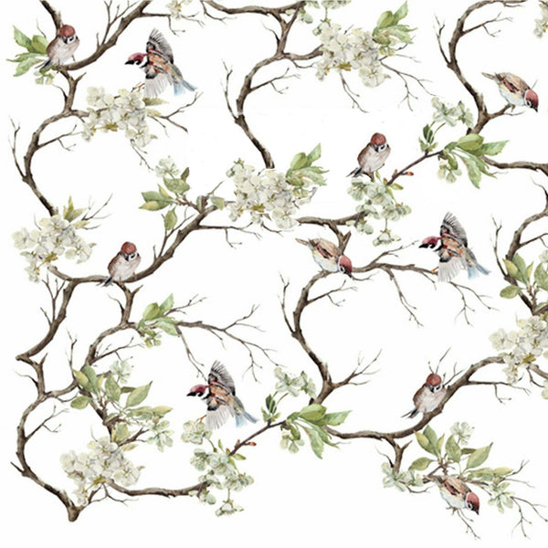 Rub-on transfer of small birds sitting on tree branches with flower blooms on a white background.