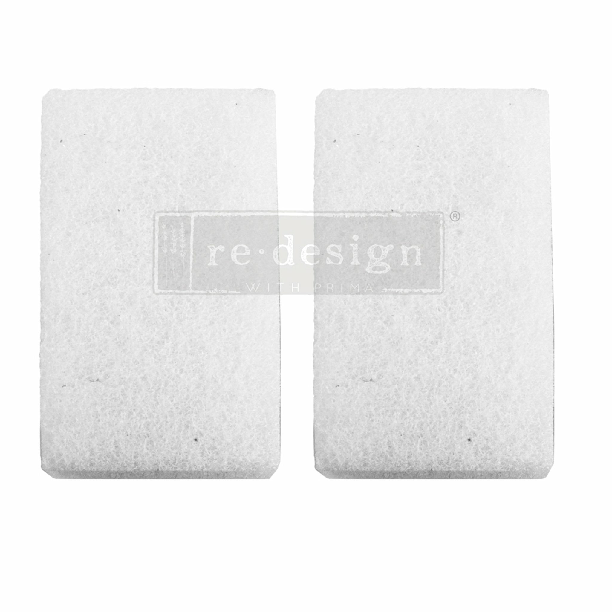 White background with two burnishing pads and a transparent redesign logo on top.