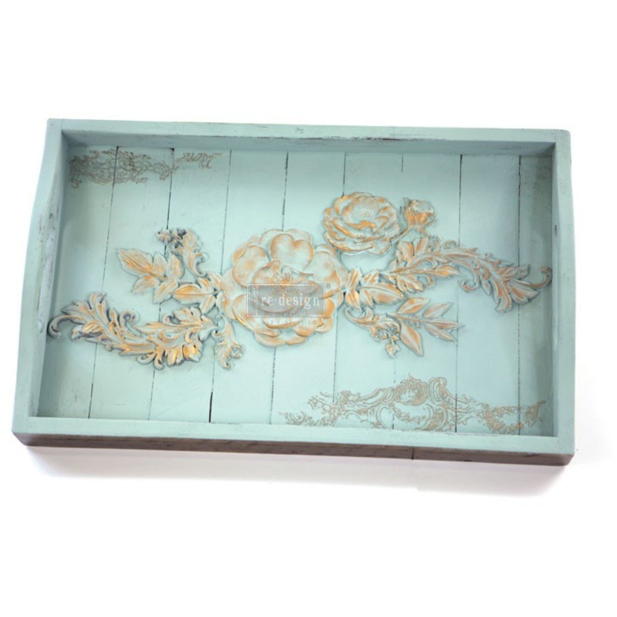 A wood serving tray is painted pale blue and features ReDesign with Prima's Baroque Swirls silicone mold casting inside of the tray.