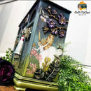 A vintage jewelry box refurbished by CeCe ReStyled is painted a blend of green and blue and features the Cherry Blossos silicone mould on it.