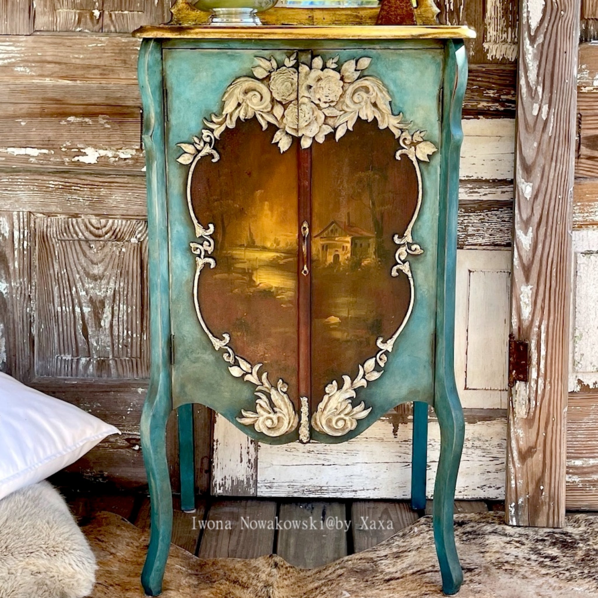 A vintage small armoire refurbished by Iwona Nowakowski @ by Xaxa is painted teal-blue and features ReDesign with Prima's Victorian Rose silicone mould around an antique brown decoupage paper design.