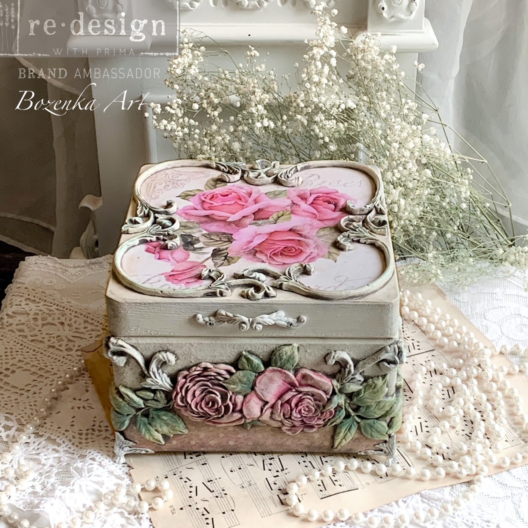 A small box refurbished by Bozenka Art is decorated with ReDesign with Prima's Victorian Rose silicone mould castings.