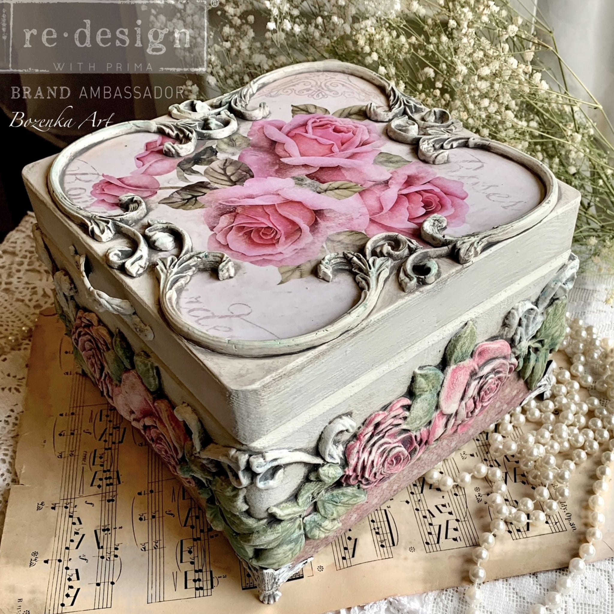 A small box refurbished by Bozenka Art is decorated with ReDesign with Prima's Victorian Rose silicone mould castings.