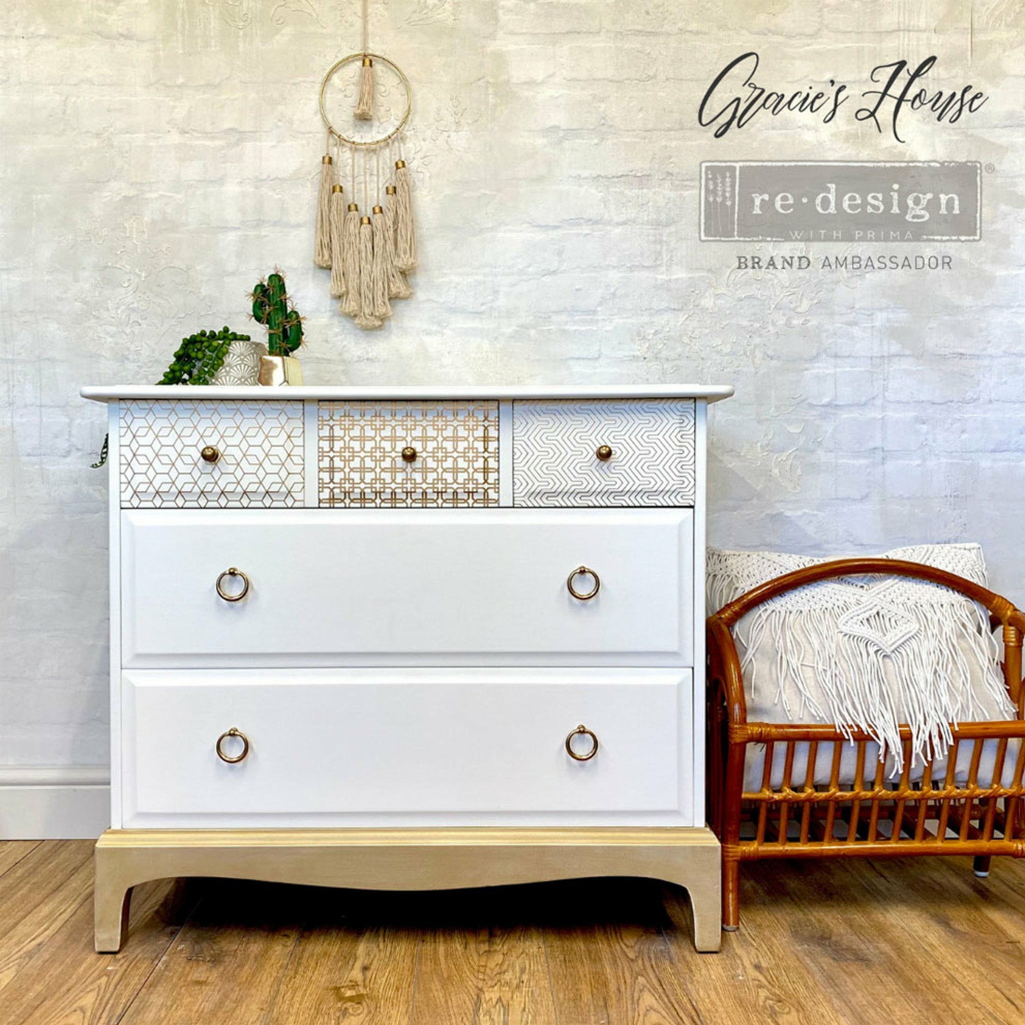 White dresser with the Motif Geometrique transfer on top. A black Gracies House Redesign brand ambassador logo on the top right.