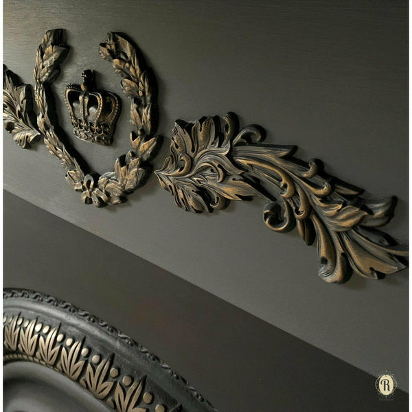 Close up of the Baroque Swirls mold on top of a black furniture piece.