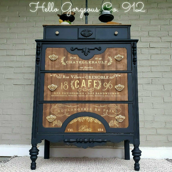 Black and wooden dresser with the Somewhere in France transfer on top. A white Hello Gorgeous Co. 912 logo at the top.