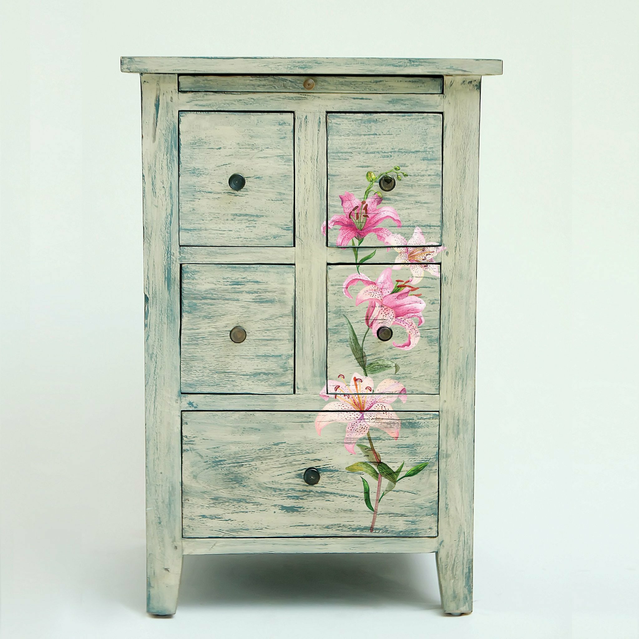 Light rustic style dresser with the Sunset Tropics transfer on top.