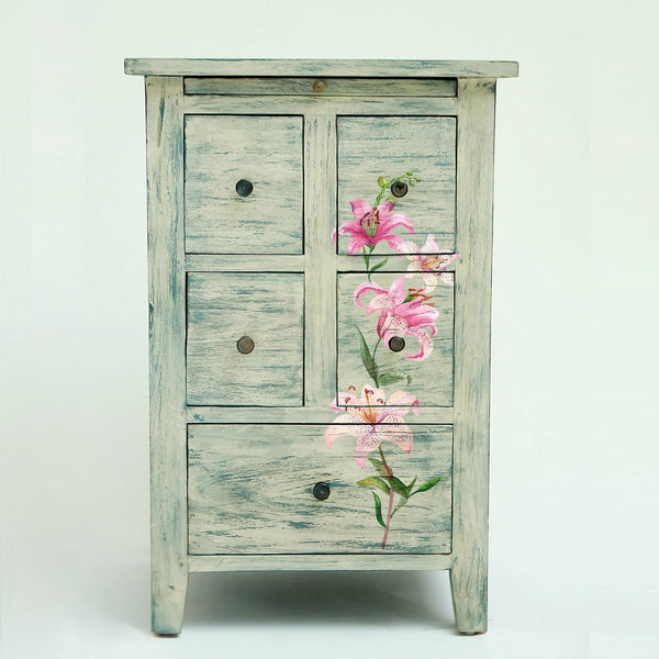 Light rustic style dresser with the Sunset Tropics transfer on top.