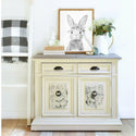 A white dresser with the Lovely Ledger transfer on top.