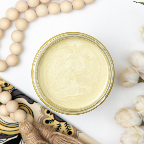 A open Wedding Belle Dixie Belle Moonshine Metallic Chalk Paint container.